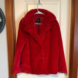 Red faux fur coat